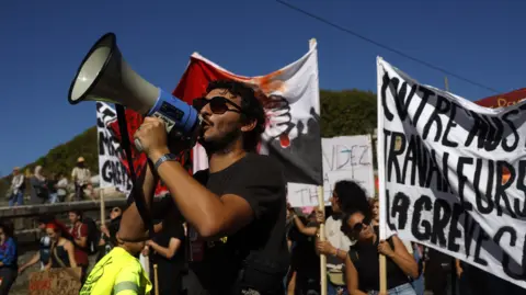 Nationwide Strikes Erupt in France Amidst Budget Cuts