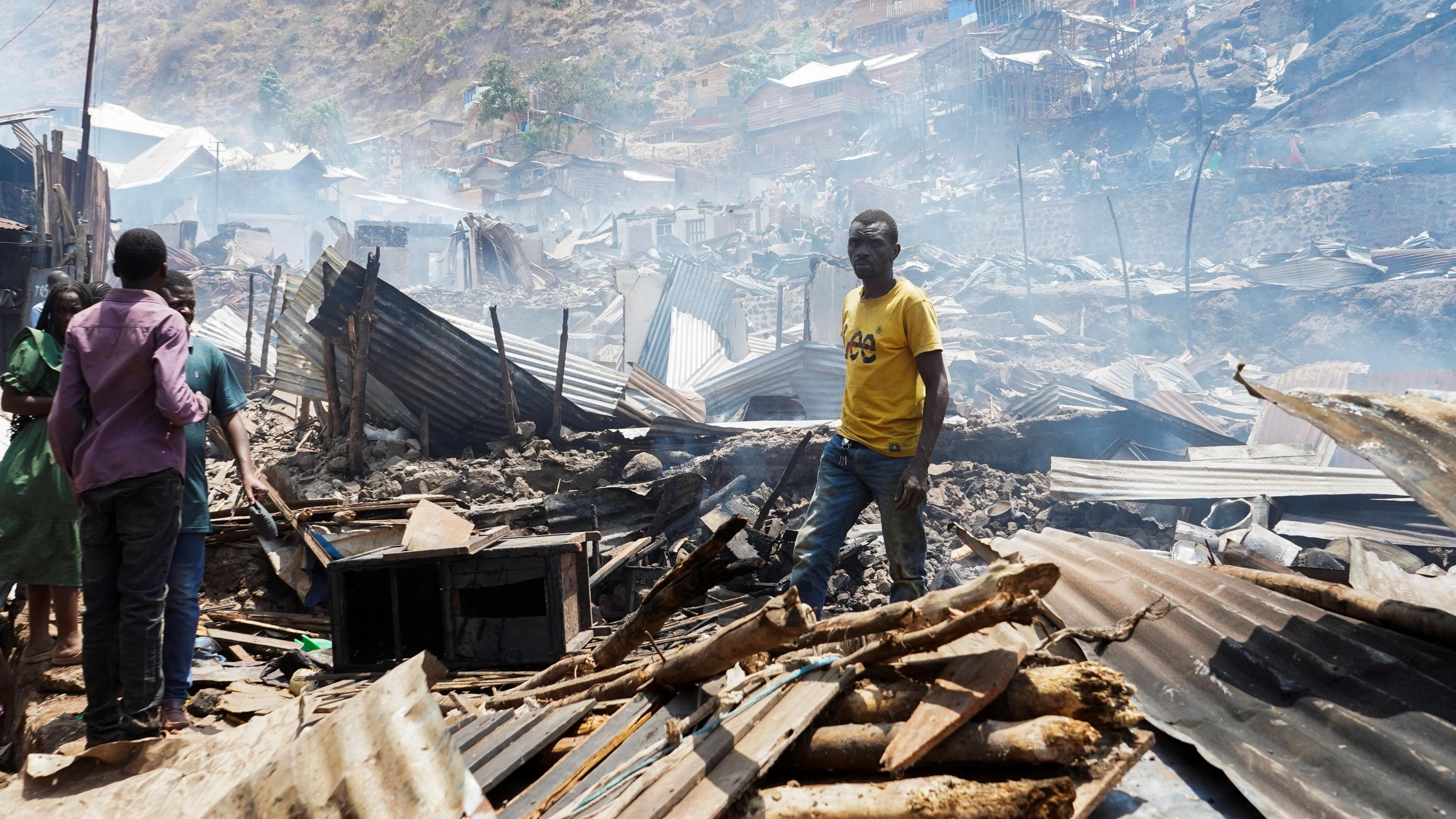 Rubble and frustrated people at Bukavu school fire