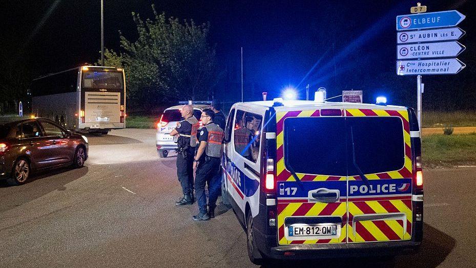 Police seal the area after a passenger train derailed in northern France