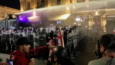 Tbilisi on Edge: Police Clash with Protesters at Presidential Palace