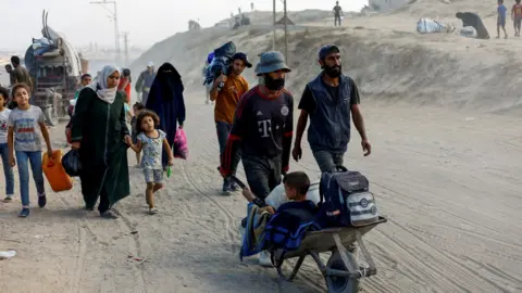 Crisis in Gaza: Palestinians Flee Israeli Offensive in Mass Exodus