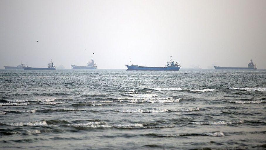 Merchant vessels at anchor