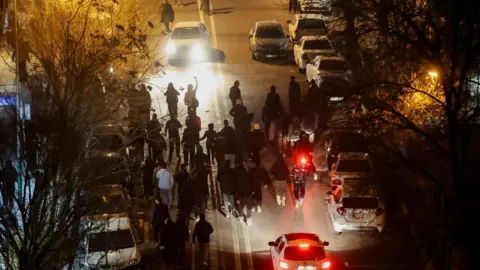 Witnesses Describe Brutal Crackdown on Iran Protests Amidst Rising Death Toll