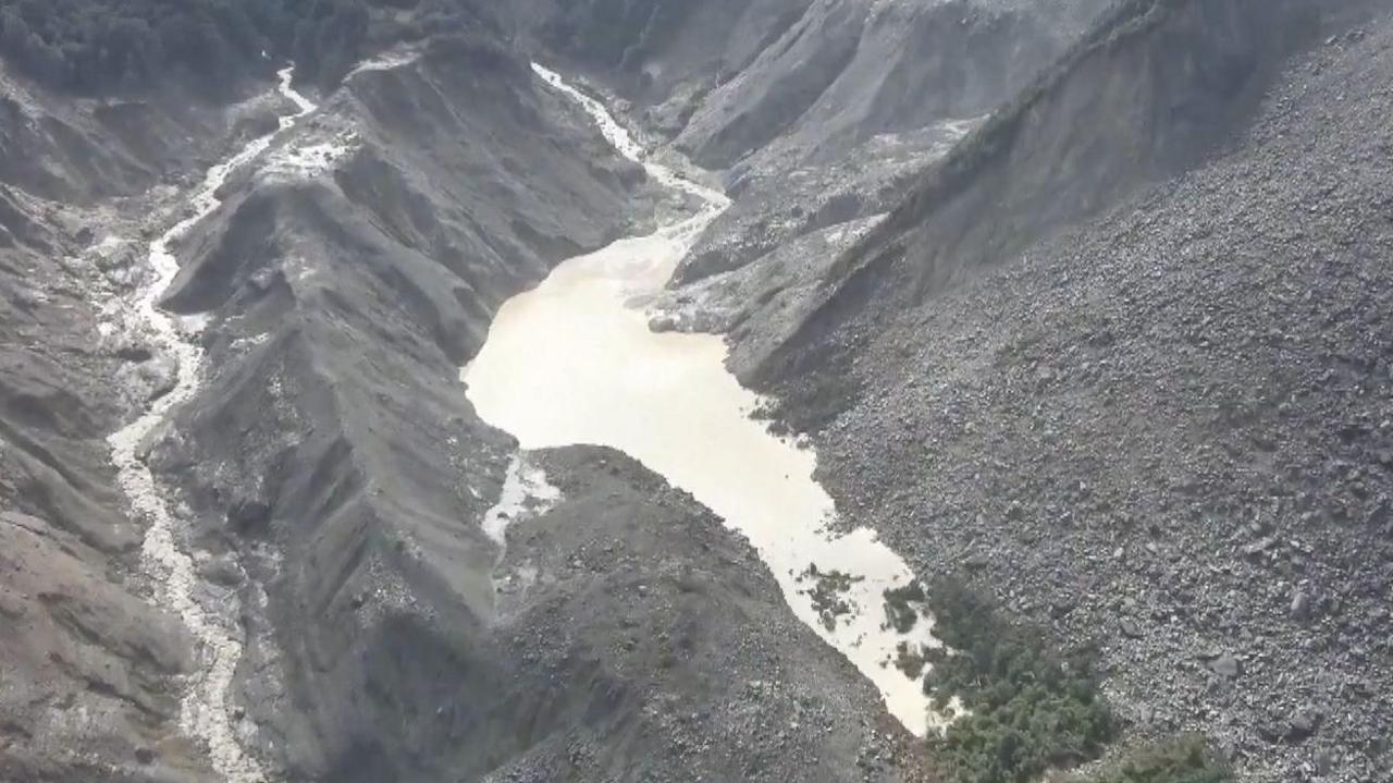 High risk lake breach threatens second flood near China‑India border