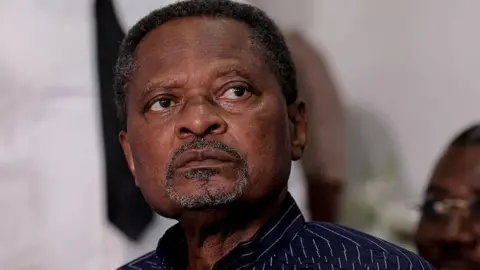 Tragedy in Cameroon: Opposition Leader Anicet Ekane Dies in Custody at 74