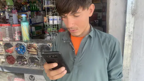 Afghans Celebrate as Internet Service is Restored Following Government Shutdown