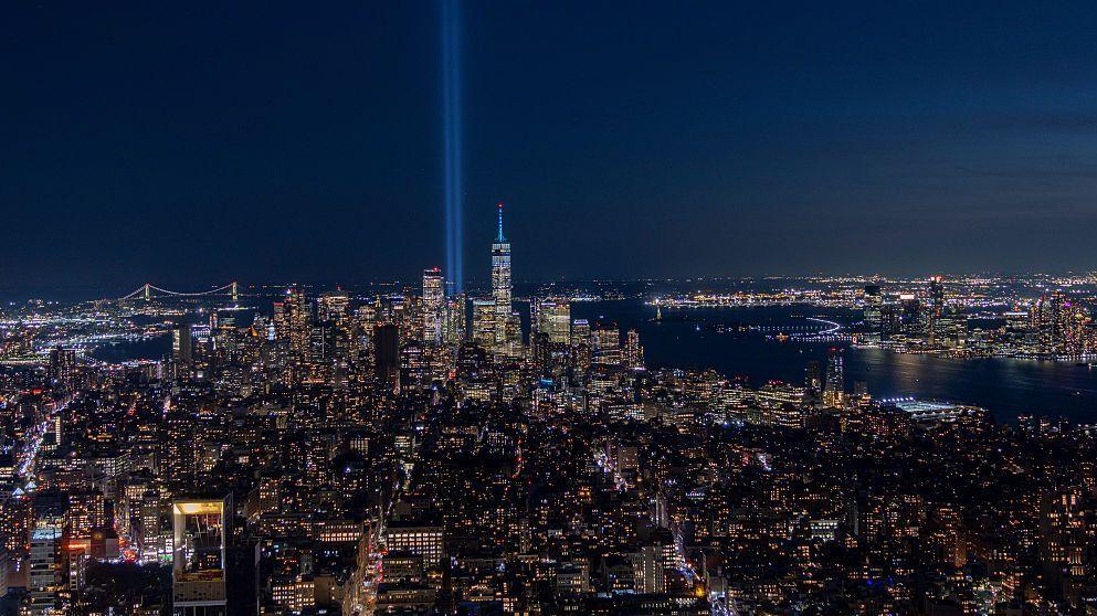 Beaming light from New York skyline into night sky