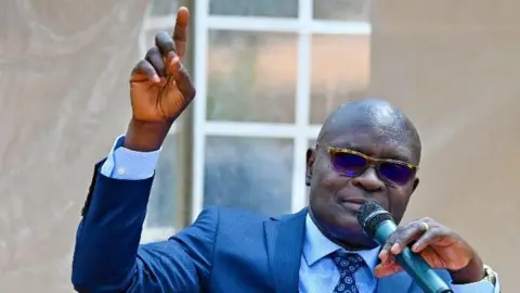 Uganda's Electoral Authority Faces Threats Amid Election Uncertainty