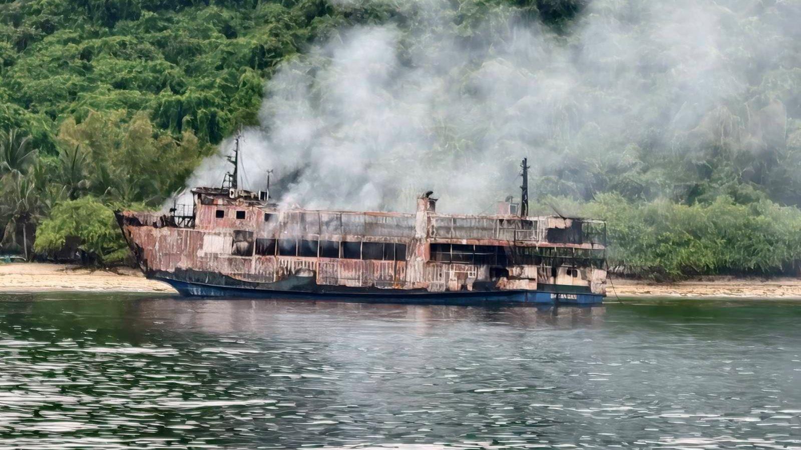 Philippine rescue crews board charred MV June Aster 40 hours after blaze