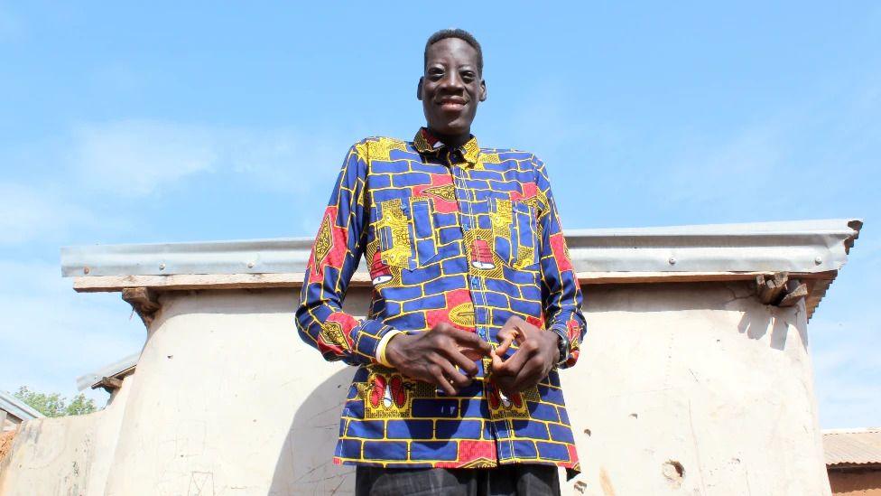 Ghana’s Tallest Man, Awuche, Passes Away – A Virtual Tribute to a Giant