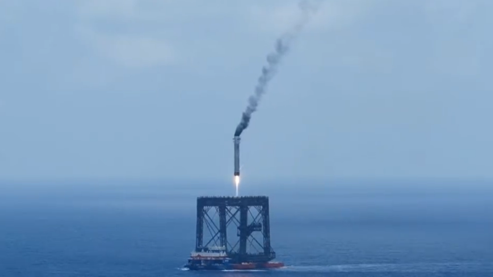 Long March 10B booster landing on a floating platform