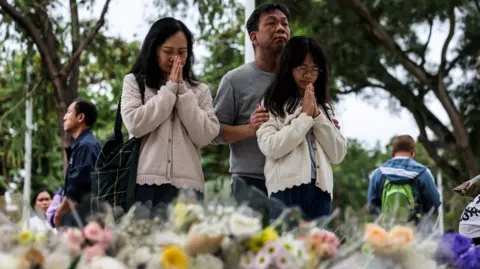 Tragedy in Hong Kong: Fire Death Toll Climbs to 146 as Community Mourns