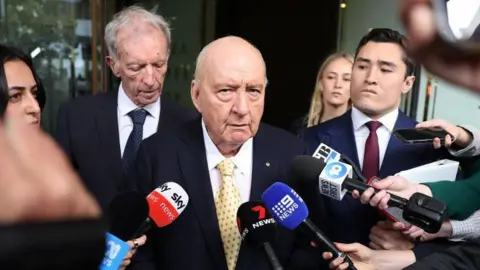 Downgraded Charges for Alan Jones: A Former Media Titan Faces Legal Trouble